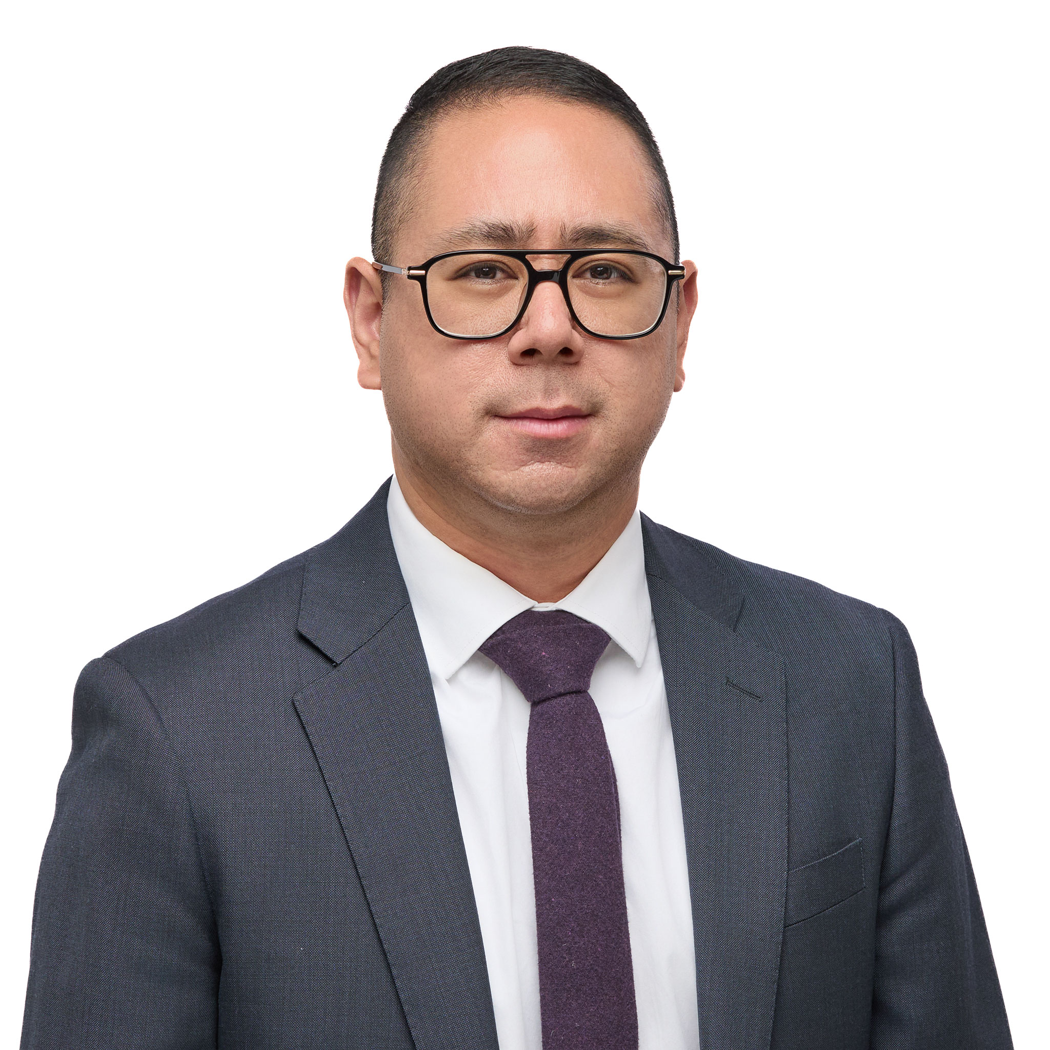 Professional headshot of attorney Patrick Hormillosa, dressed in a suit and tie, wearing glasses, from Lepera Law.